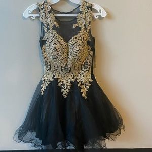 Beautiful elegant birthday/homecoming dress! Worn one time size XS, by ANNY LEE.